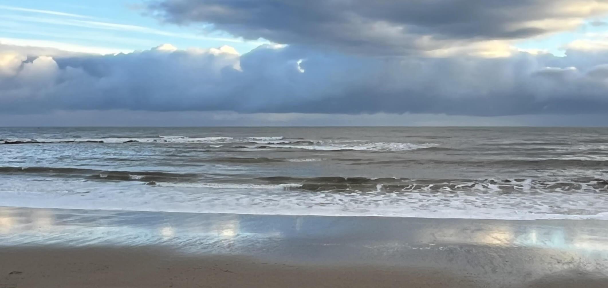 Sea and cloudy sky