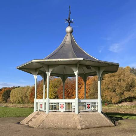 Durham bandstand with autumn trees in the background